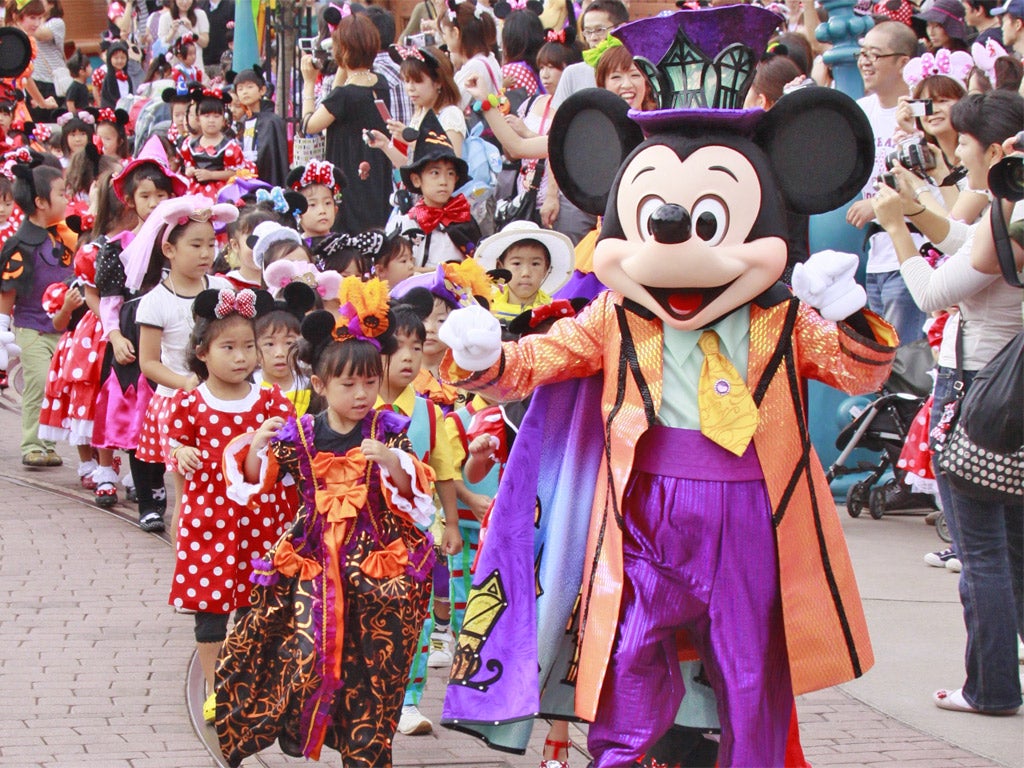 Mickey leads a parade at Disneyland