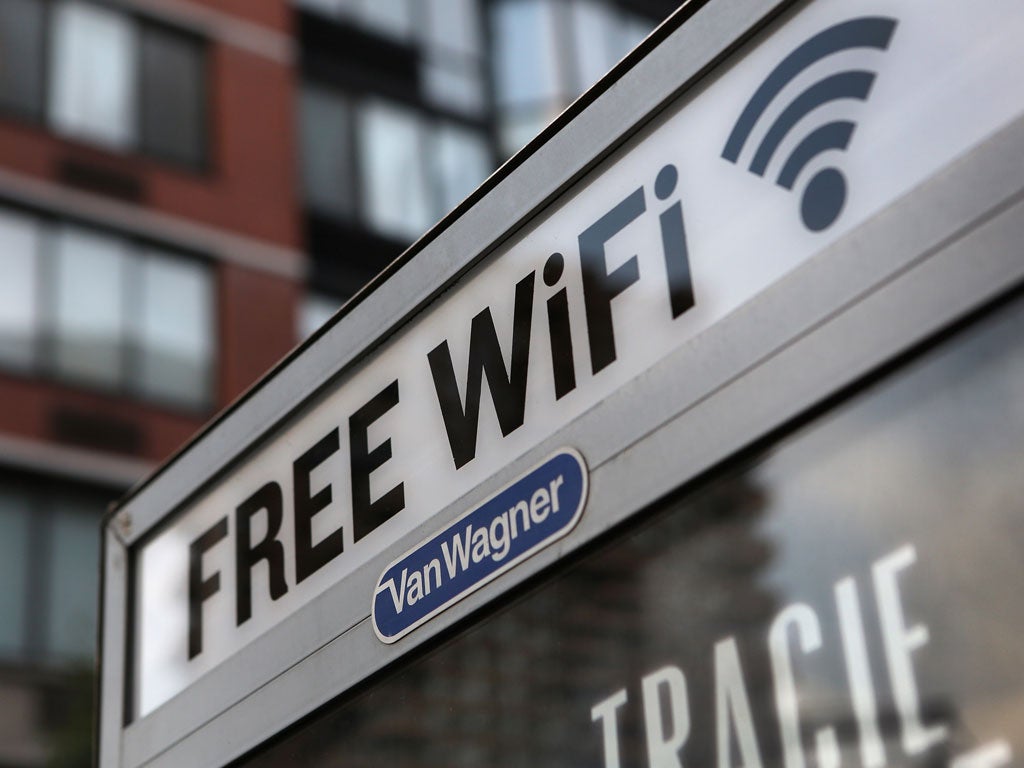 A free Wi-Fi hotspot beams broadband internet from atop a public phone booth on July 11, 2012 in Manhattan, New York City