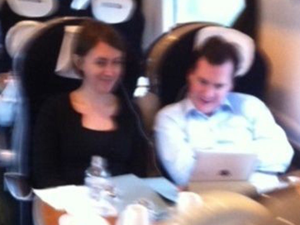 A smartphone shot of Osborne at his first class seat