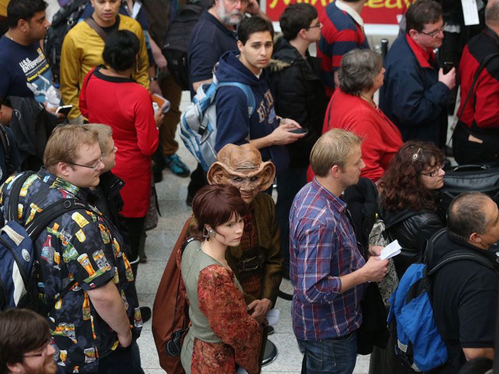 Star Trek characters ‘Leeta’ and ‘Rom’ arrive at the convention; fans dressed as ‘Judge Q’ and a science officer