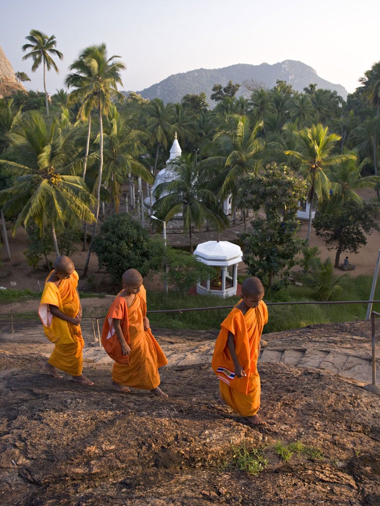 Novice monks in front of the Ambasthale Dagoba, Mihintale, Sri Lanka