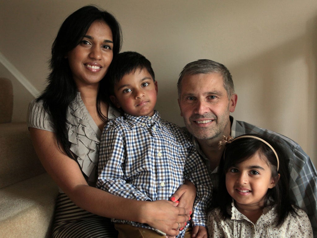 Happy family: Tina and Joe Milkovic with five-year-old Ilya and Isabella