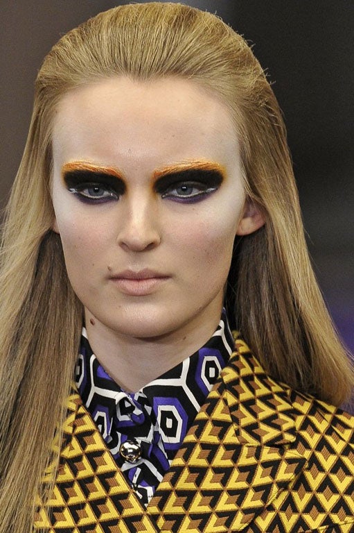 Stripes and geometries decorated eyelids at Prada