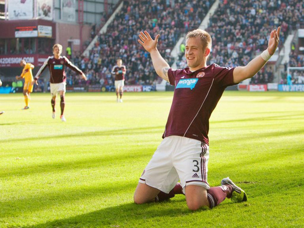 Danny Grainger, of Hearts, celebrates his 30-yard winning strike against Motherwell