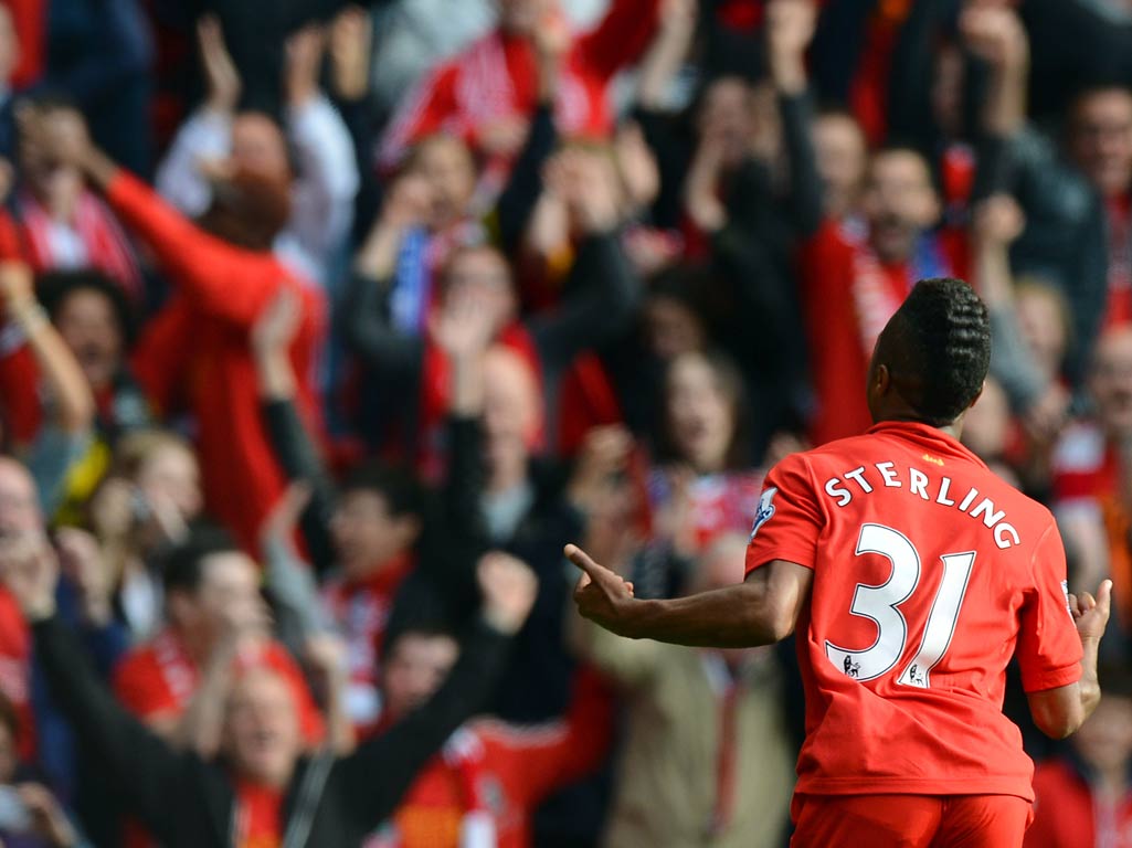 Raheem Sterling celebrates his first senior goal for Liverpool