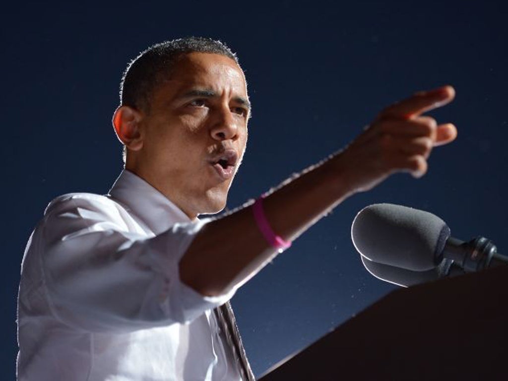 Obama at a campaign rally in Cleveland yesterday