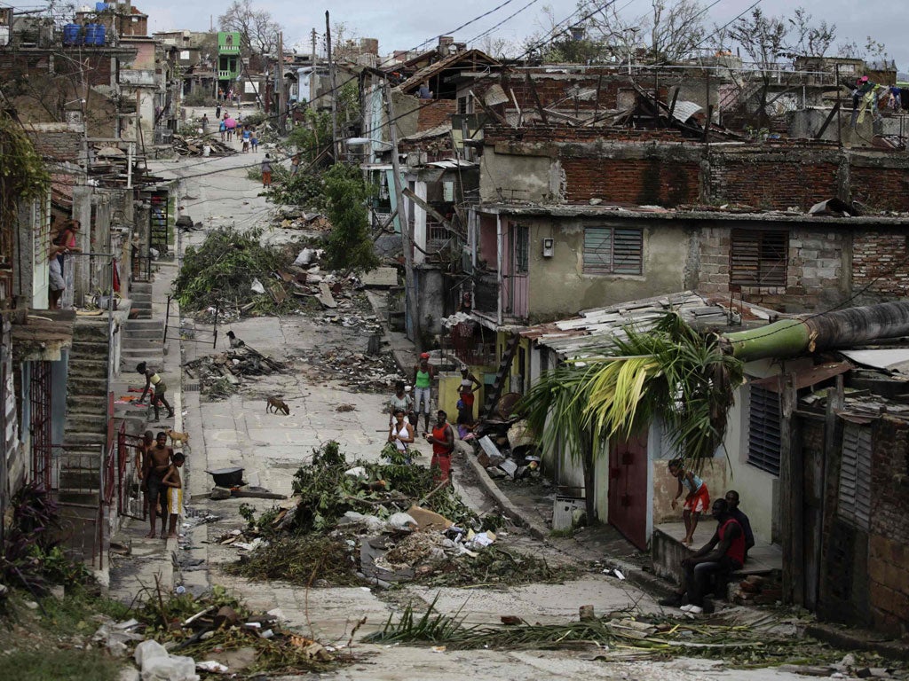 Santiago de Cuba looked yesterday after a pummelling from Hurricane Sandy