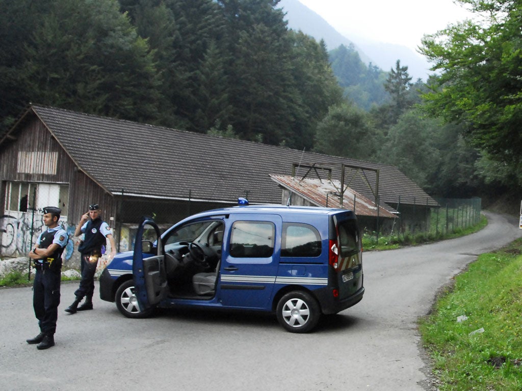 Roadblock: Gendarmes near the scene of the Annecy shootings last month