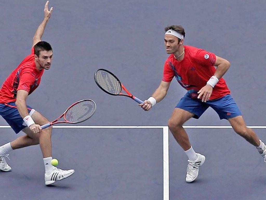 Ross Hutchins (right) and Colin Fleming in action in the Shanghai
Rolex Masters