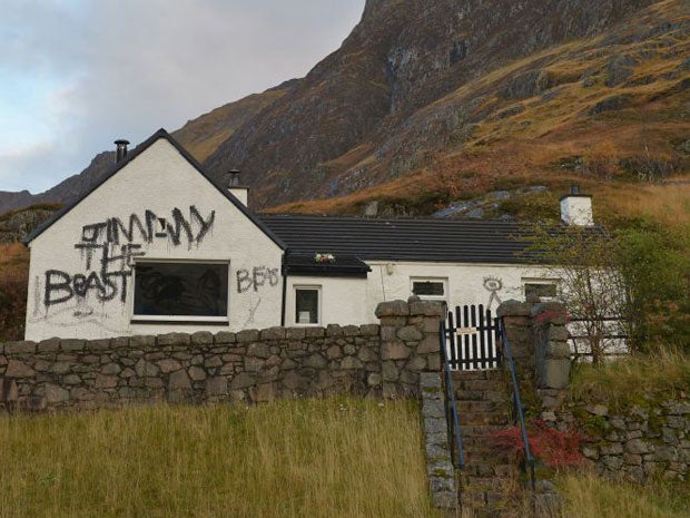 Slogans painted on Alt-na-reigh, the cottage owned by Jimmy Savile