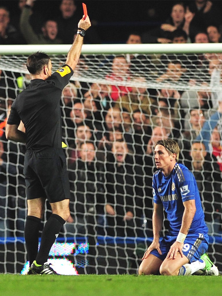 Chelsea's striker Fernando Torres is sent off by Mark Clattenburg