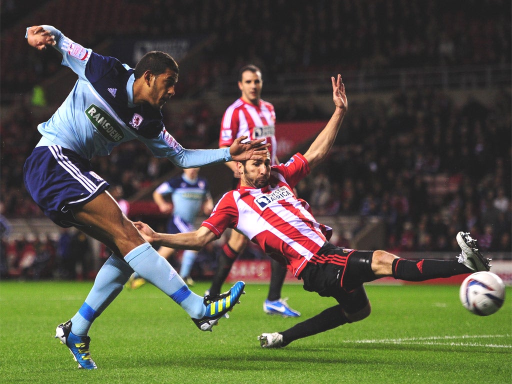 Middlesborough's Haroun fires in a shot