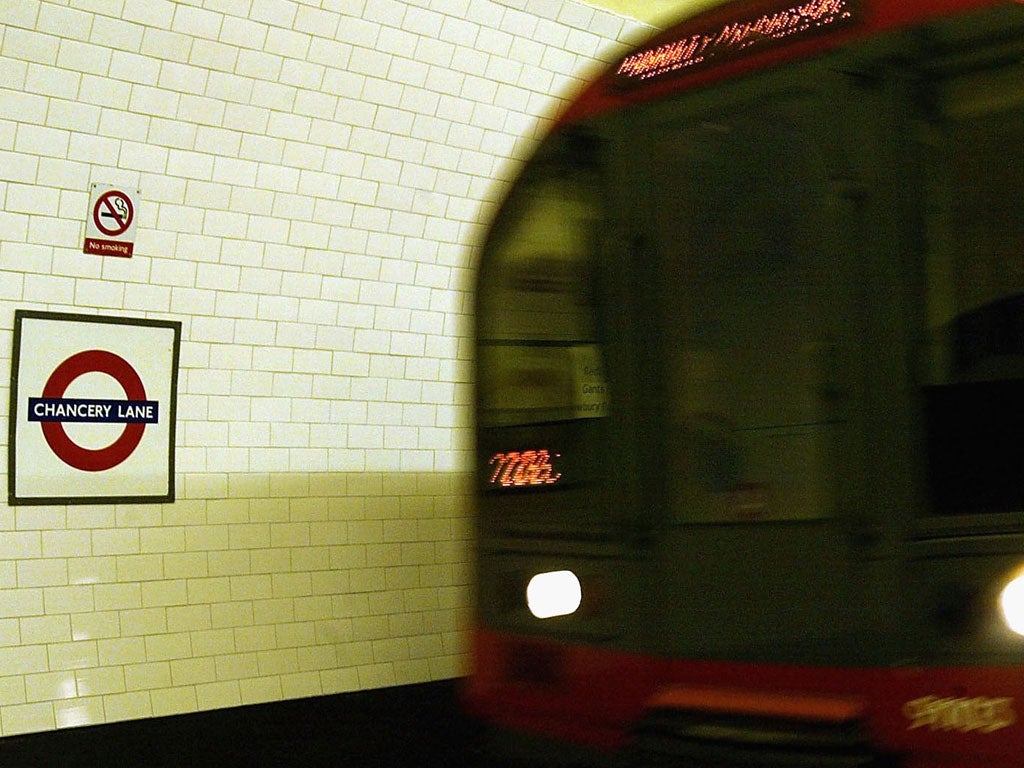 A train arrives at Chancery Lane station on the Central Line