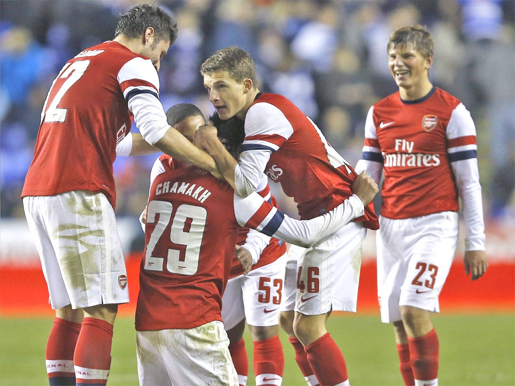 Arsenal celebrate their seventh goal on Tuesday