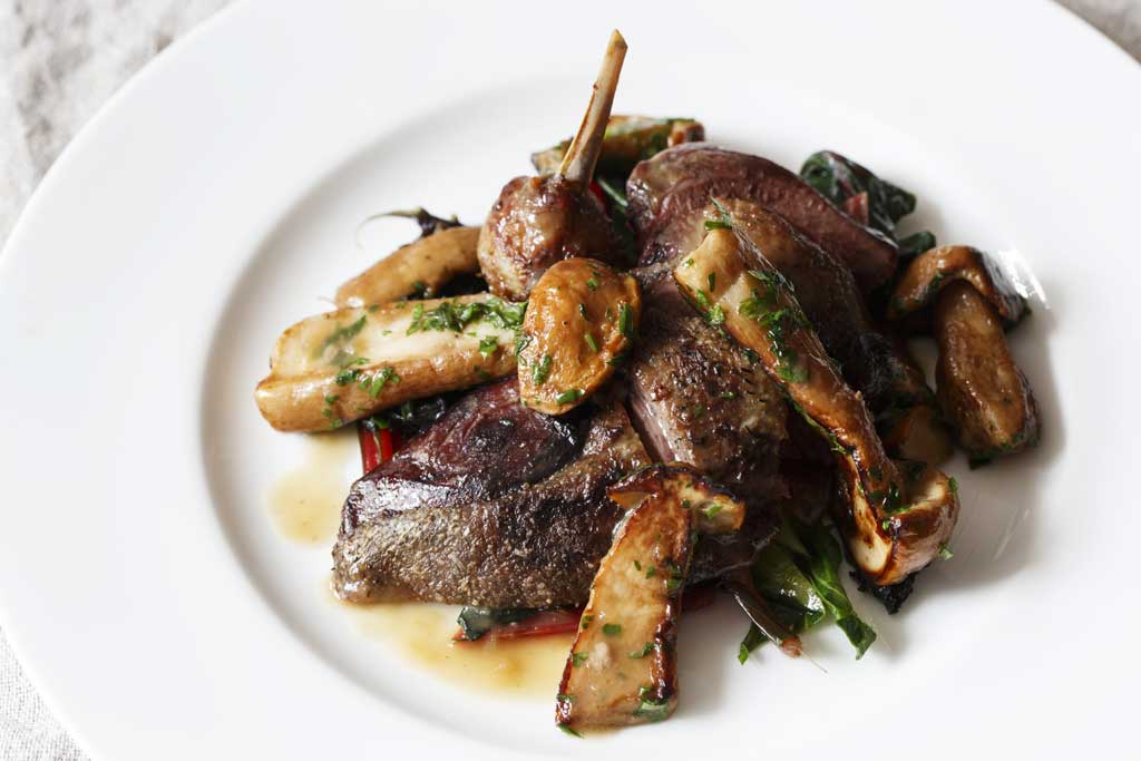 Roast mallard with autumn greens and ceps