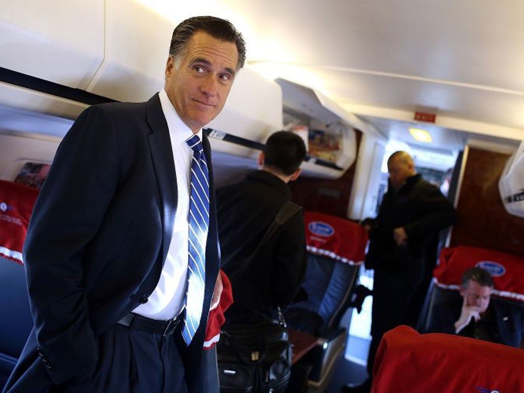 Mitt Romney on a flight during his 2012 campaign (Getty)