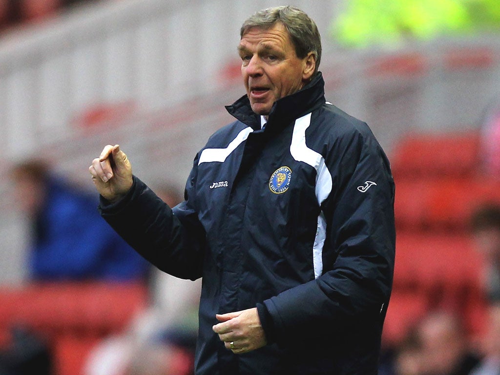 Empty handed: Graham Turner looks on helplessly as his team are beaten