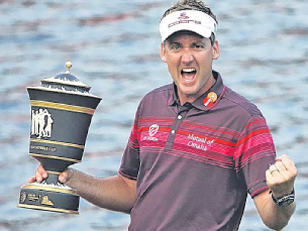 Ian Poulter celebrates winning the HSBC Champions yesterday