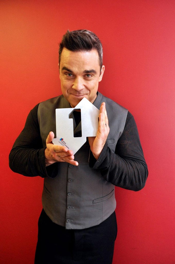 Robbie Williams has reached Number 1 with "Candy"