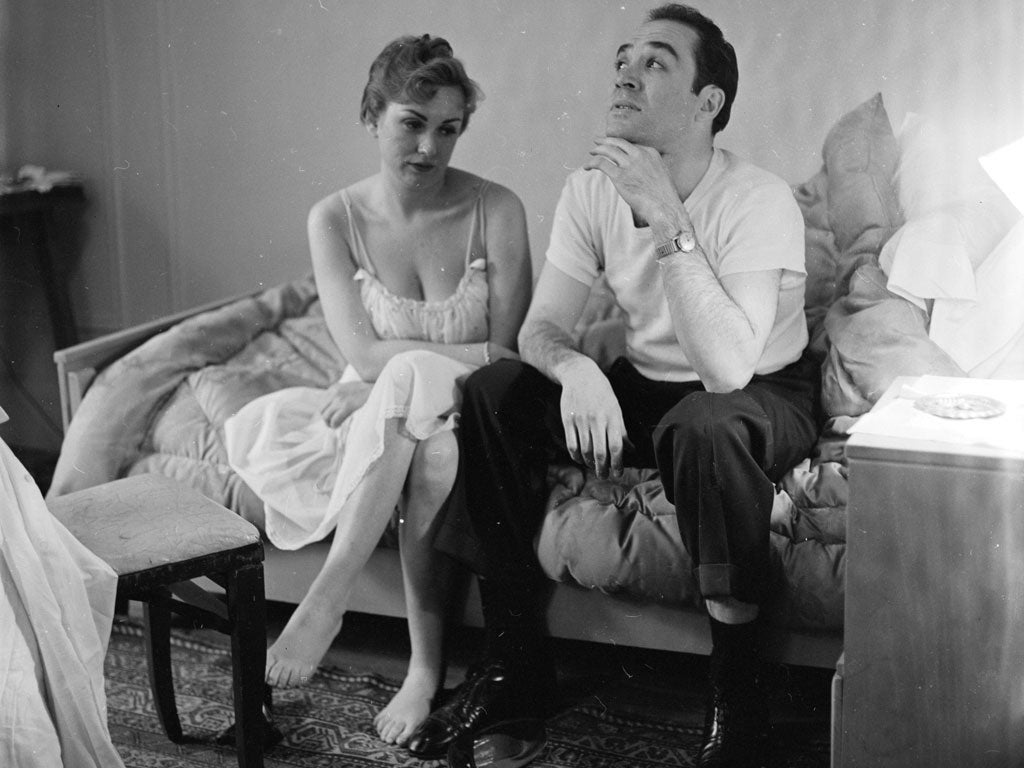 A married couple contemplating divorce. 1955.