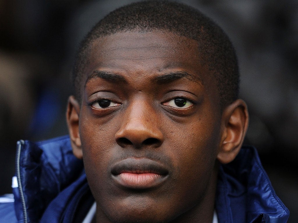 Marvin Sordell of Bolton Wanderers looks on from the stand