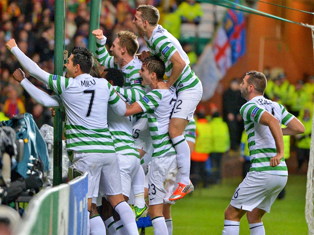 Celtic players surround Victor Wanyama after he scored the opening goal