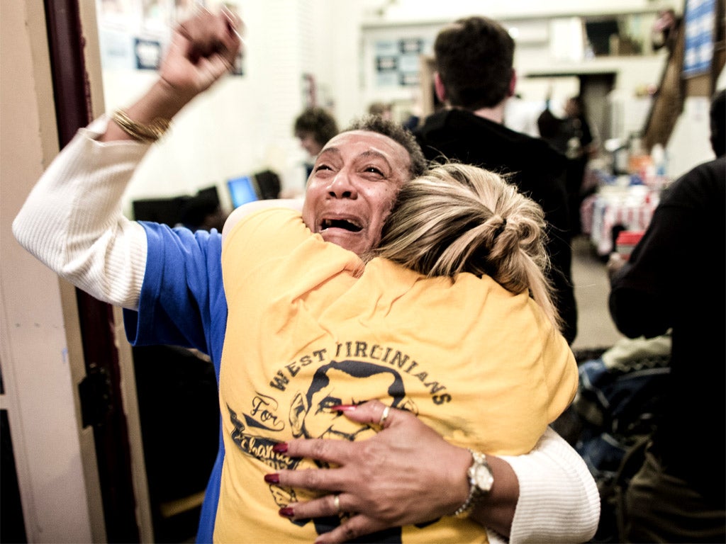 Sandi Rue cheers as she watches the results in Steubenville