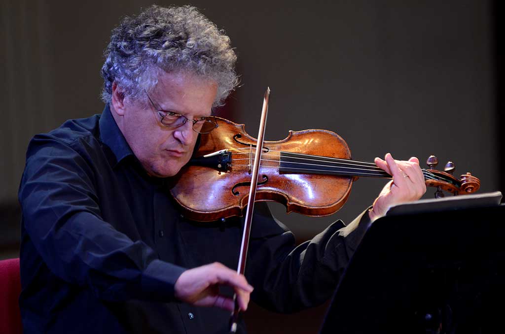 Solo violinist Irvine Arditti will perform Cage's Freeman Études