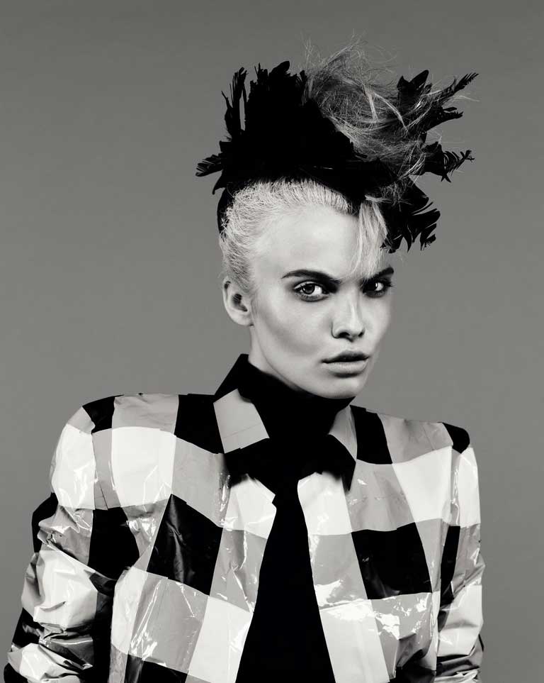 Sheer roll-neck jumper, £847, and feather head pieces, £537 each, both by Ann Demeulemeester, from Selfridges, 400 Oxford Street, London W1, 0800 123 400; tape jacket, price on application, by Maison Martin Margiela, 22 Bruton Street, London W1, 020-7629 2682