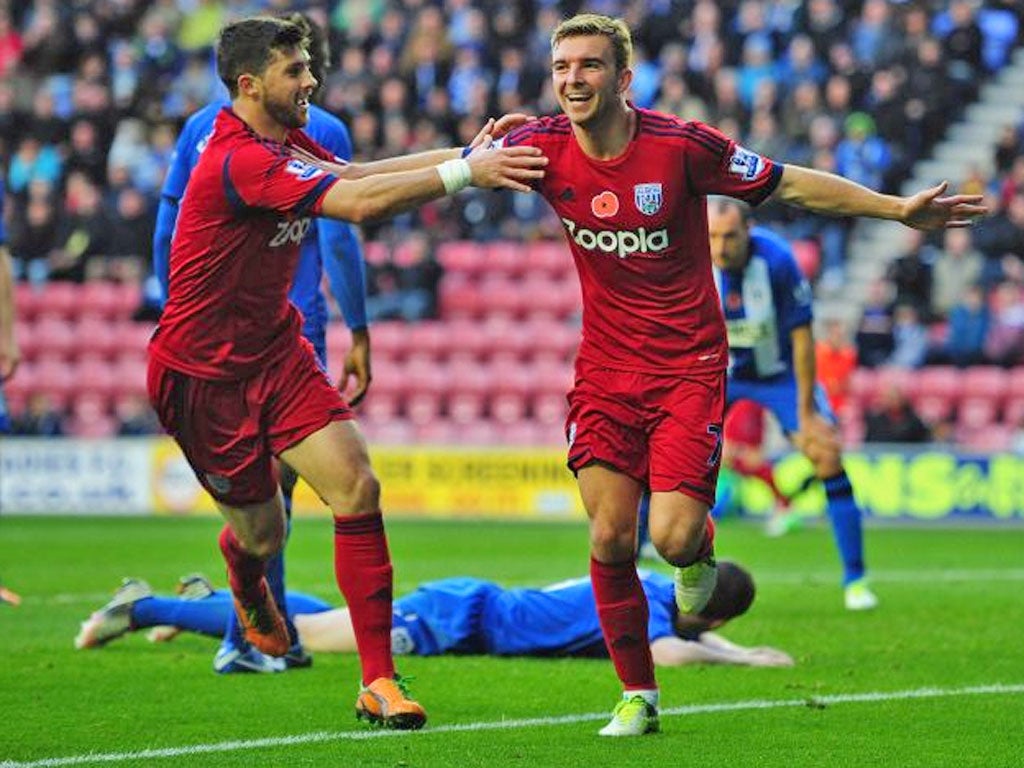 West Bromwich AlbionJames Morrison, right, celebrates after scoring the first goal with Shane Long during the Barclays Premier League match against Wigan