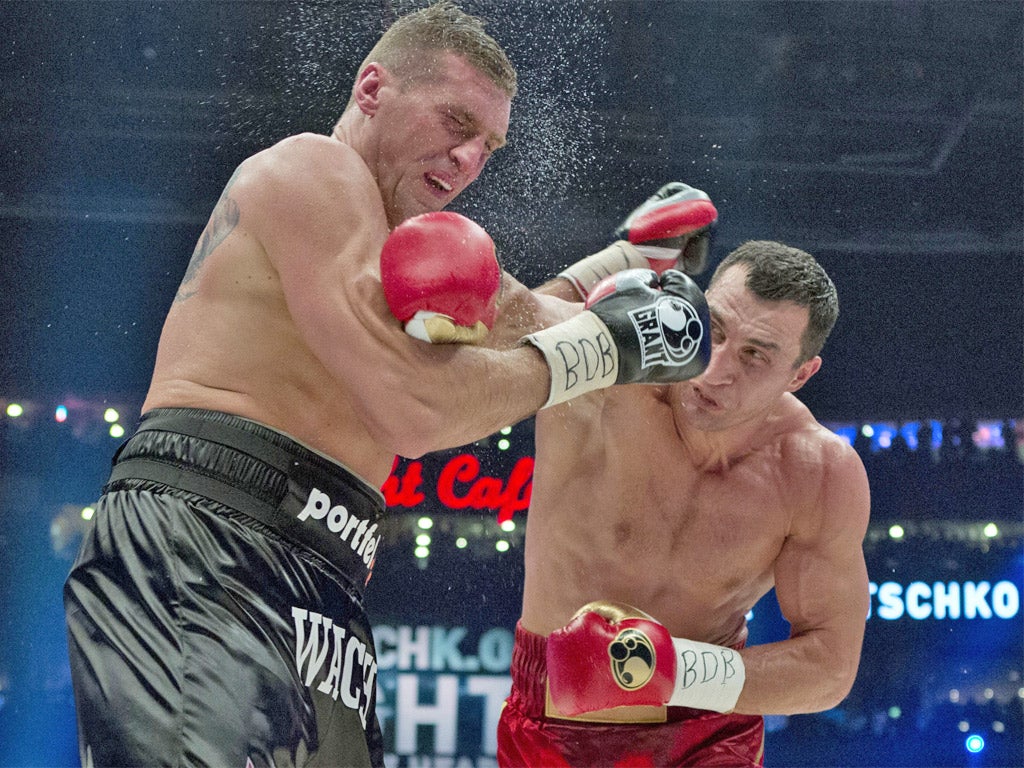 Wladimir Klitschko (right) took 12 rounds to defeat Mariusz Wach