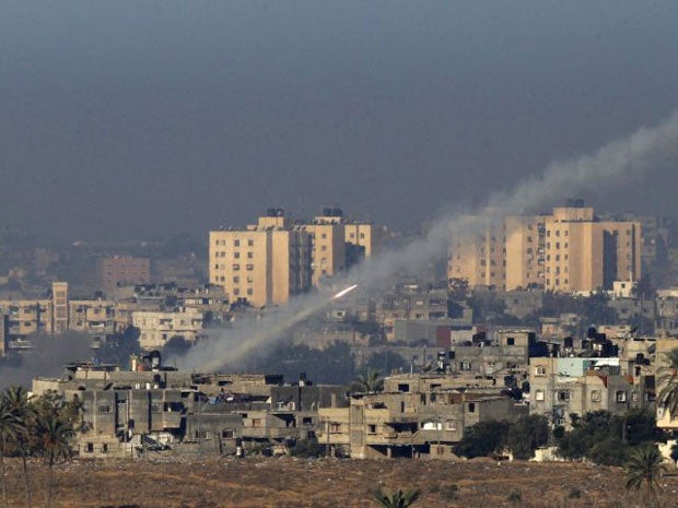 A rocket is seen after its launch from the northern Gaza Strip towards Israel today