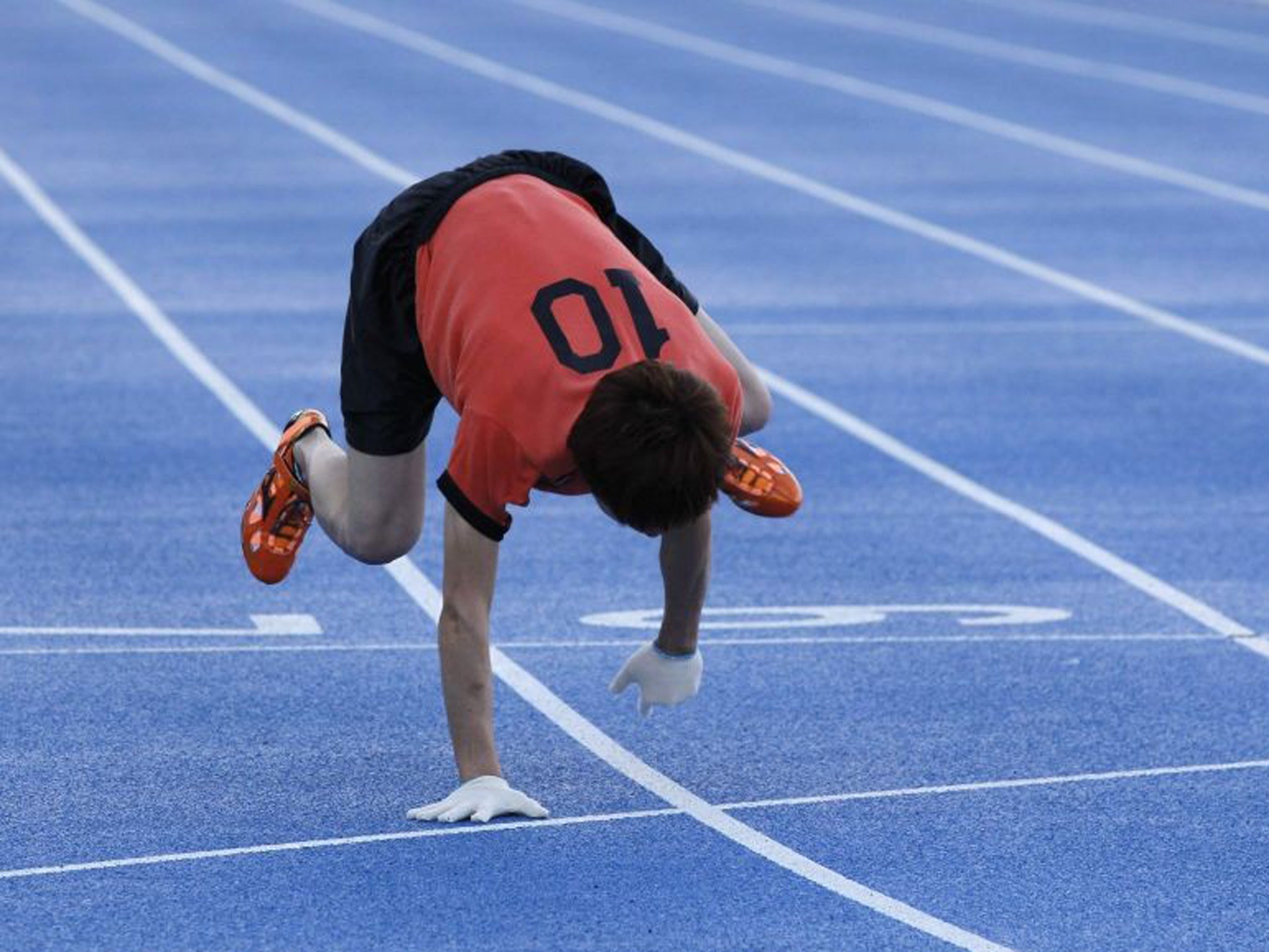 Kenichi Ito on his way to breaking the Guinness World Records for running the 100 metres on all fours