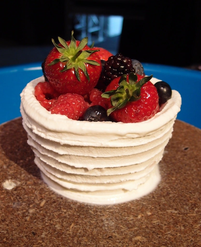 Strawberries in ice cream: An ice cream pot filled with fruit by Charlie Harry Francis