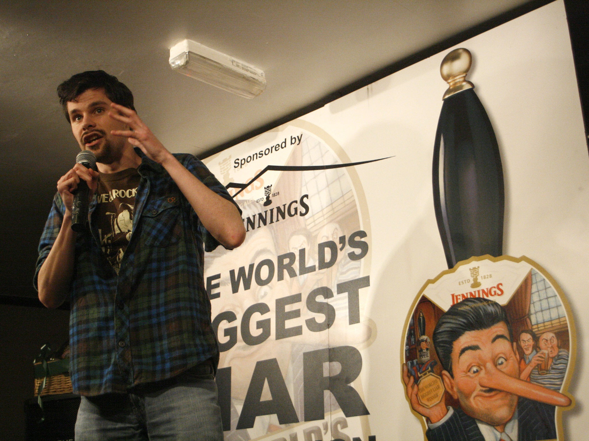 Jack Harvey, winner of the 2012 World's Biggest Liar contest spins his tale at the Santon Bridge Inn, Wasdale