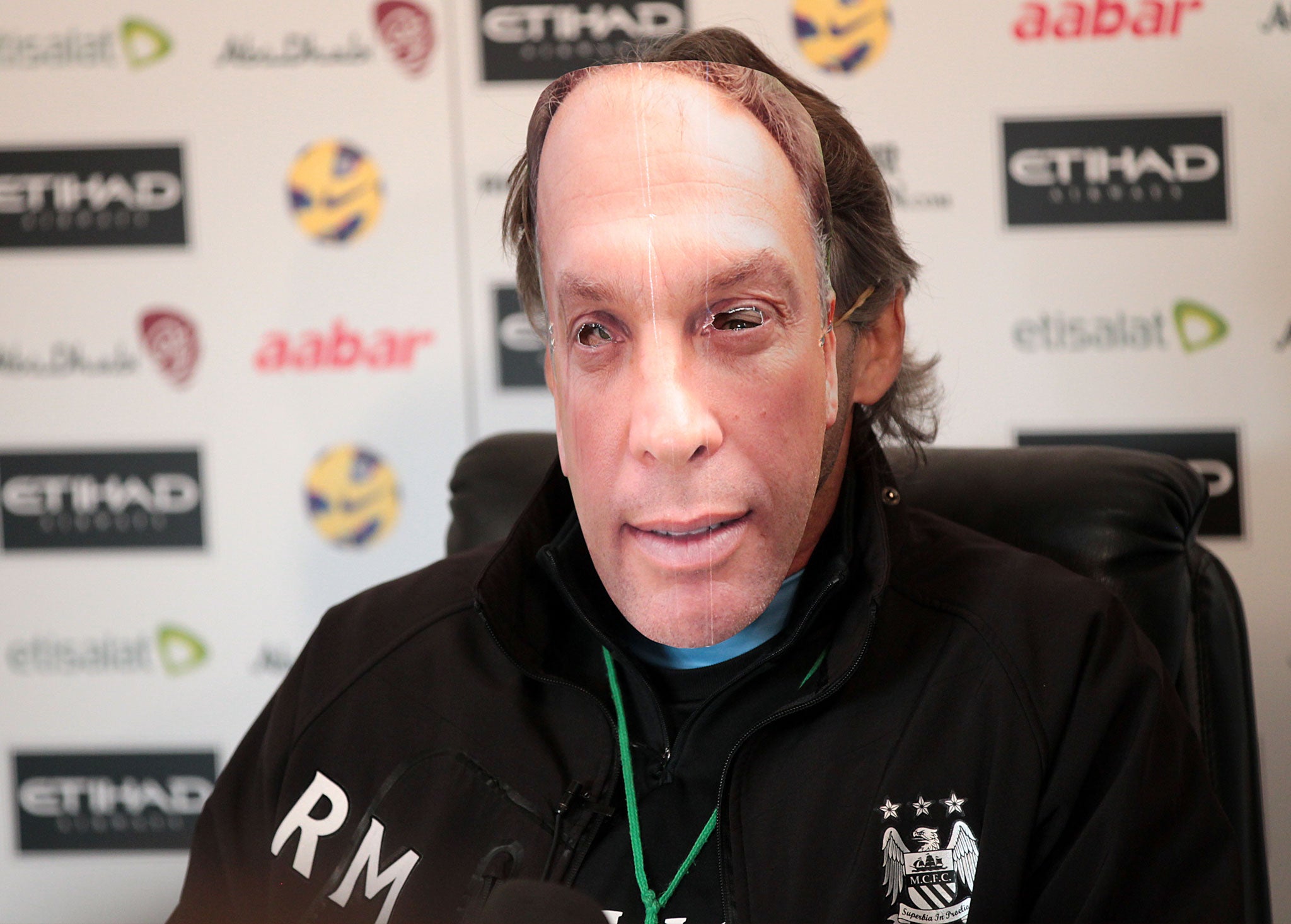 Mancini broke the ice at this morning's press conference by arriving in a David Platt mask, following criticism about his assistant appearing in his place in his last two conferences.