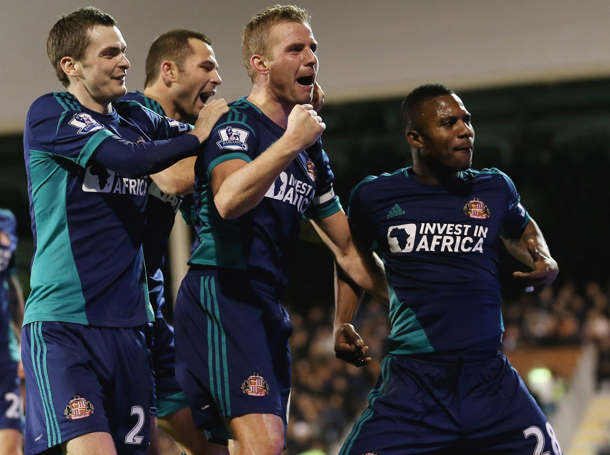 Stephane Sessegnon (far right) celebrates with his teammates