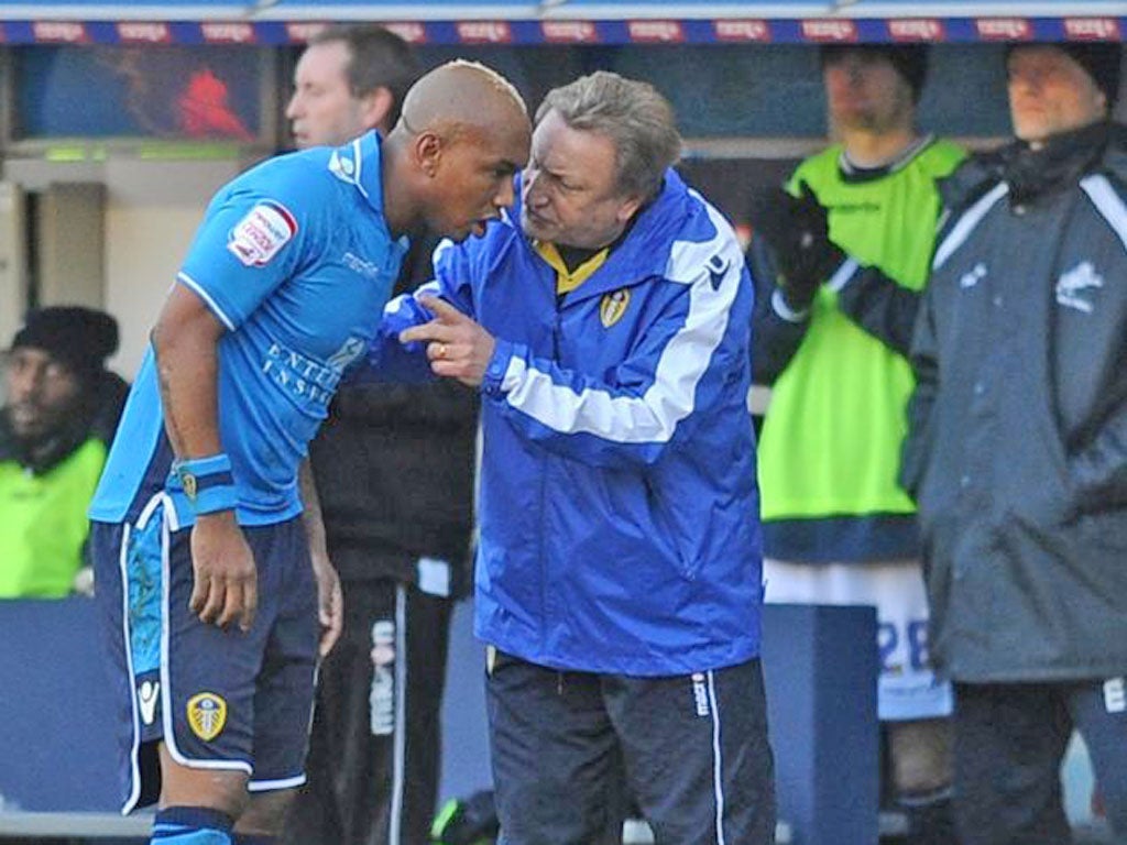 El-Hadji Diouf speaks to Leeds manager Neil Warnock yesterday