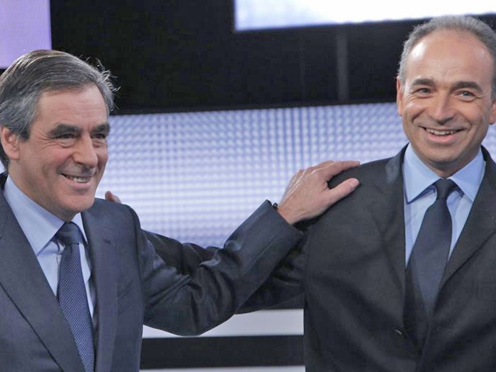 The former French Prime Minister François Fillon, left, stood
against the UMP’s secretary general Jean-François Copé for
leadership of the party