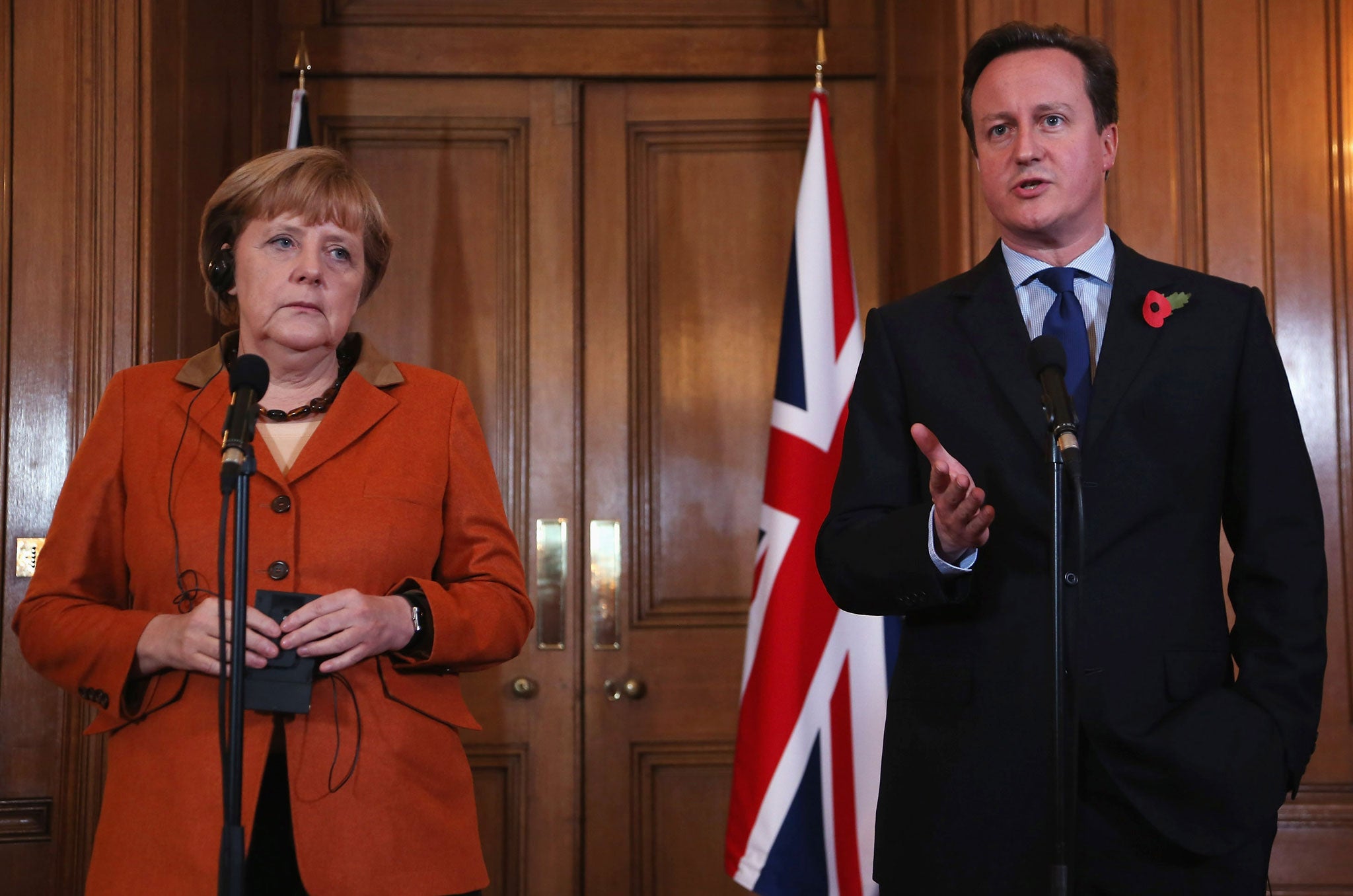 British Prime Minister David Cameron and German Chancellor Angela Merkel speak to the press ahead of a bilateral meeting at 10 Downing Street on November 7, 2012 in London, England.