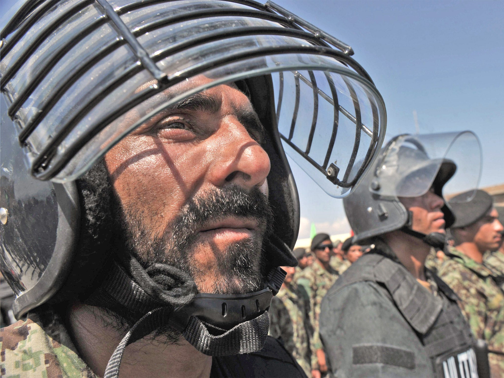 Afghan National Army soldiers stand in formation during a ceremony handing over the Bagram prison to Afghan authorities in September