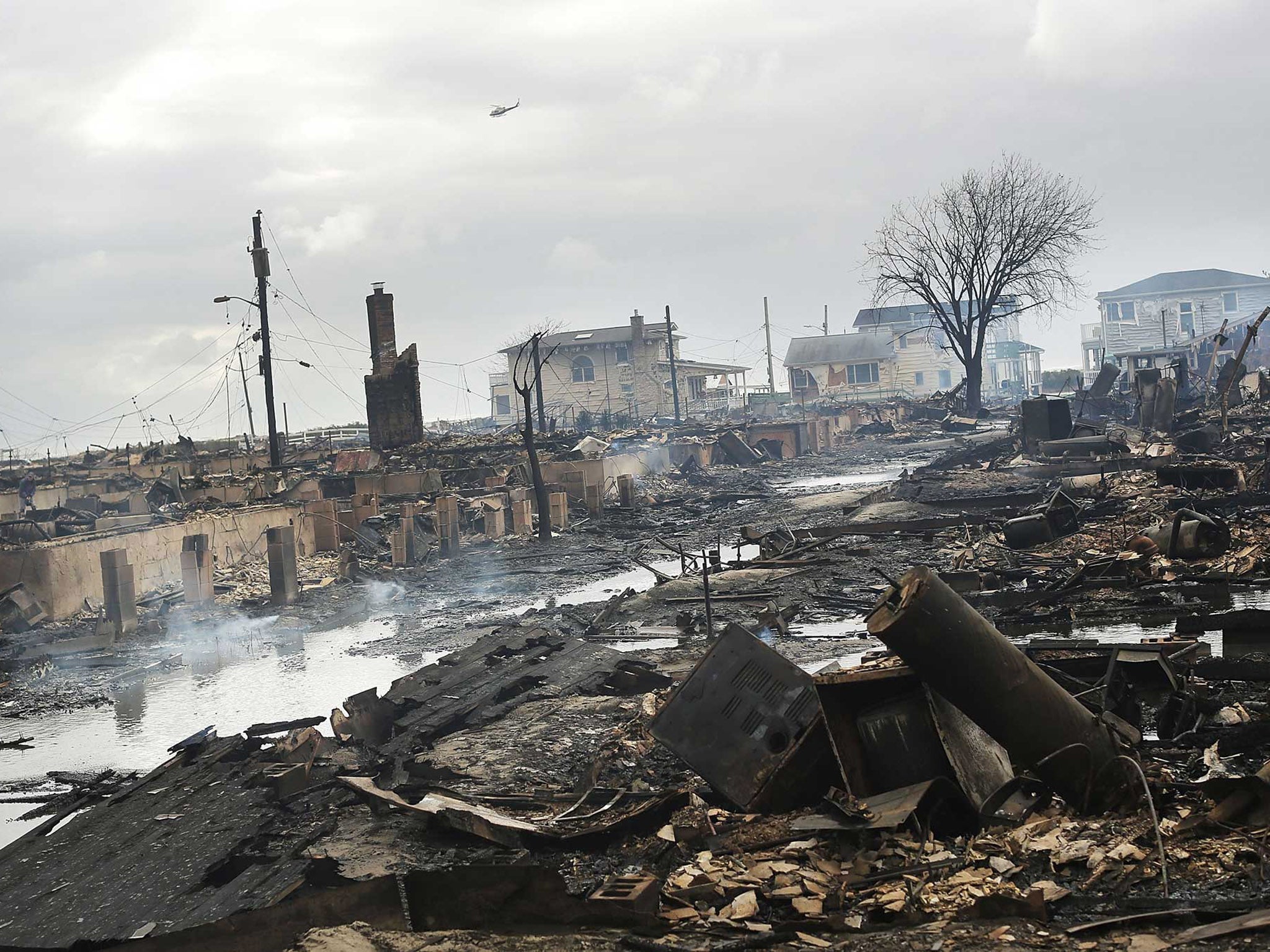 Over 50 homes were destroyed in a fire in the Breezy Point neighbourhood of New York