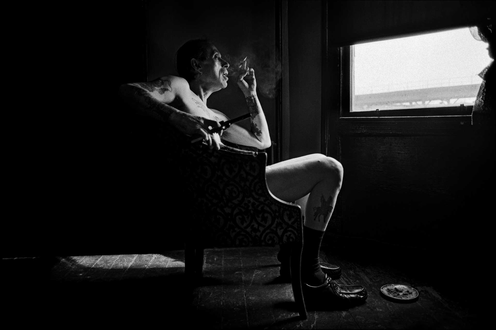 Charlie holds his new handgun, 1996