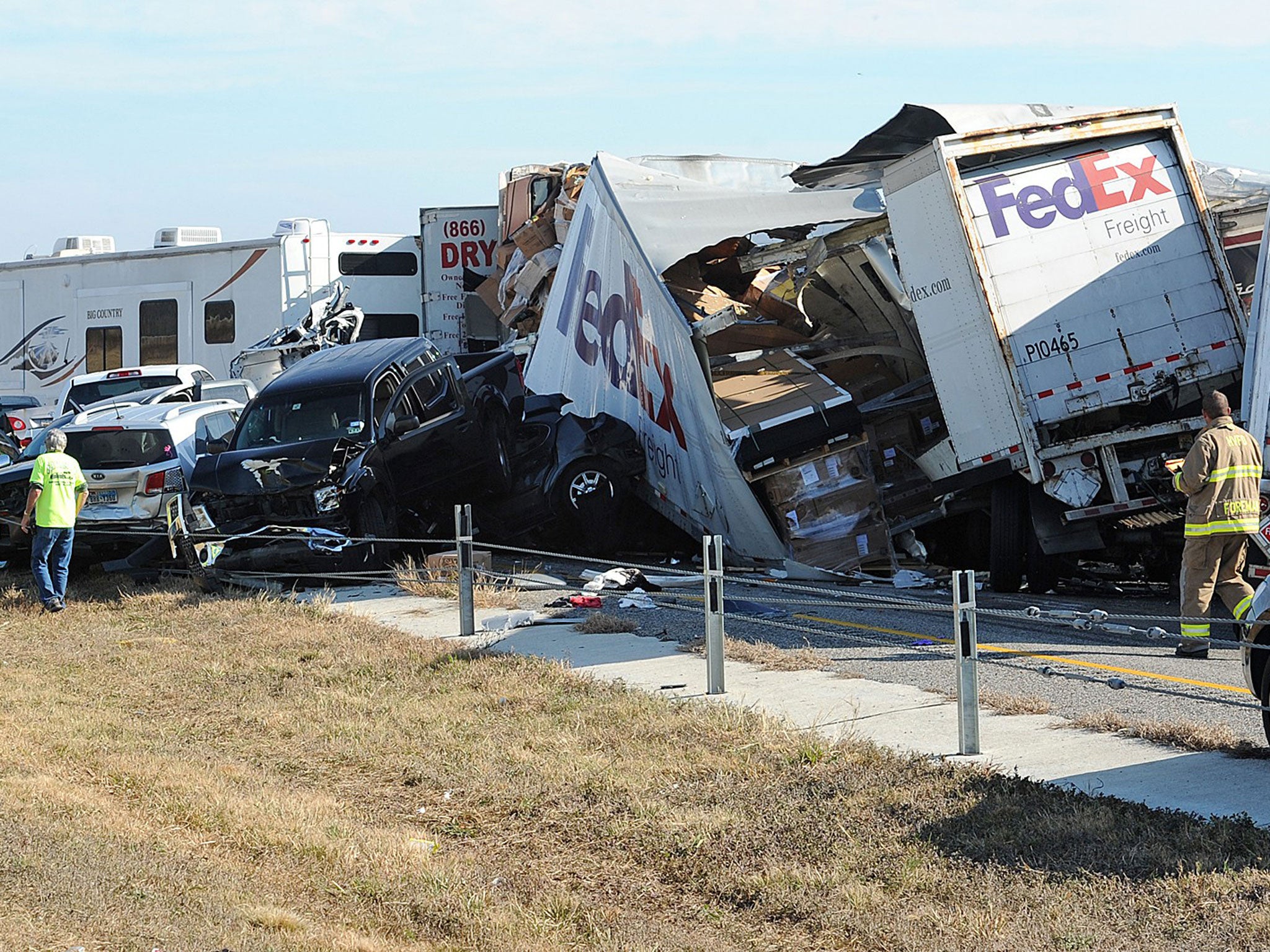 v2-Two people died and more than 80 were hurt when at least 140 vehicles collided on a Texas highway in dense fog