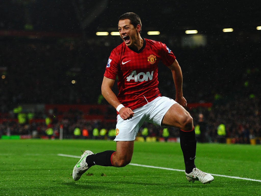 Javier Hernandez of Manchester United celebrates scoring his team's third goal