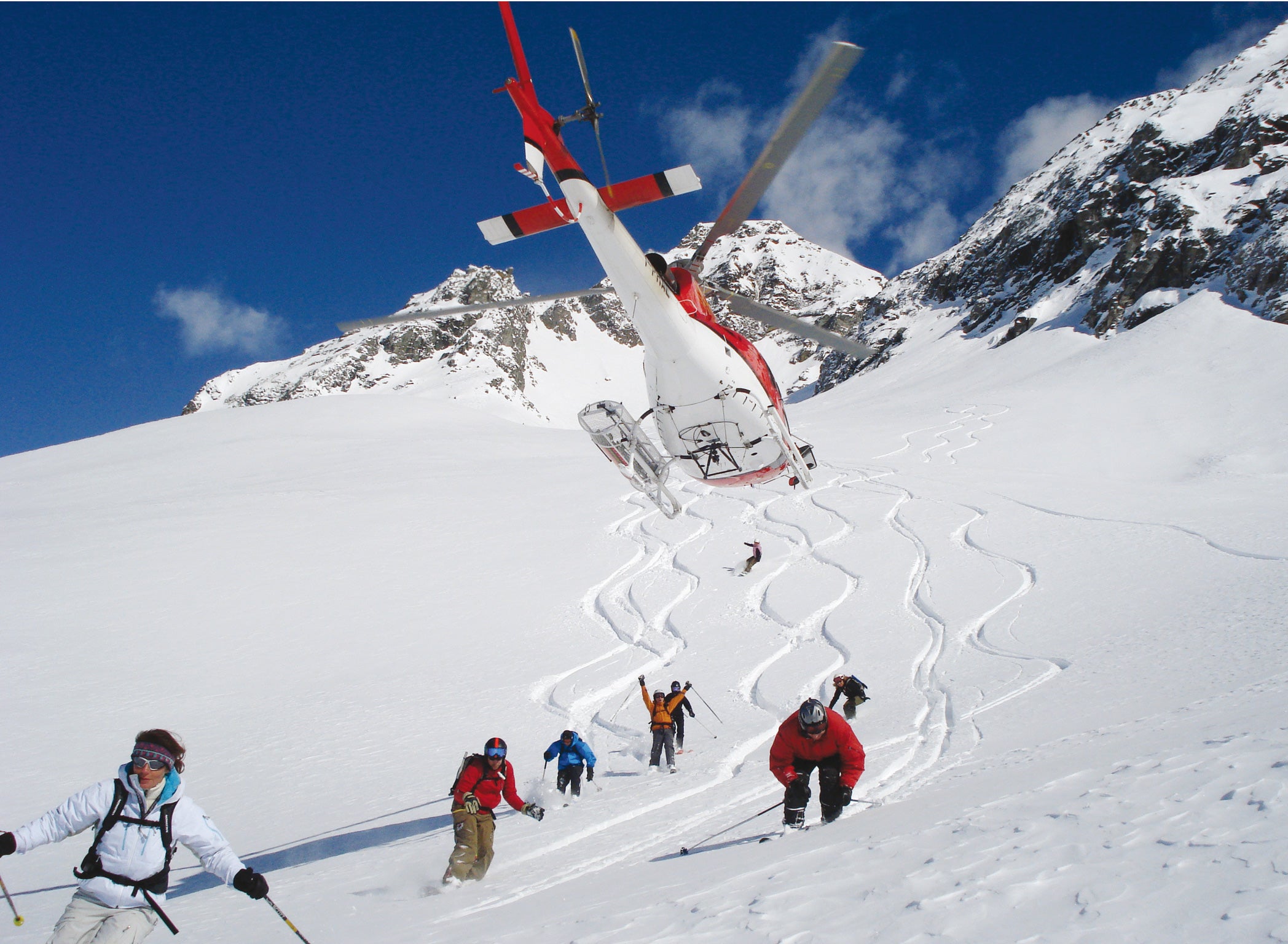 New tracks: heliskiers take to the slopes in the Italian Alps