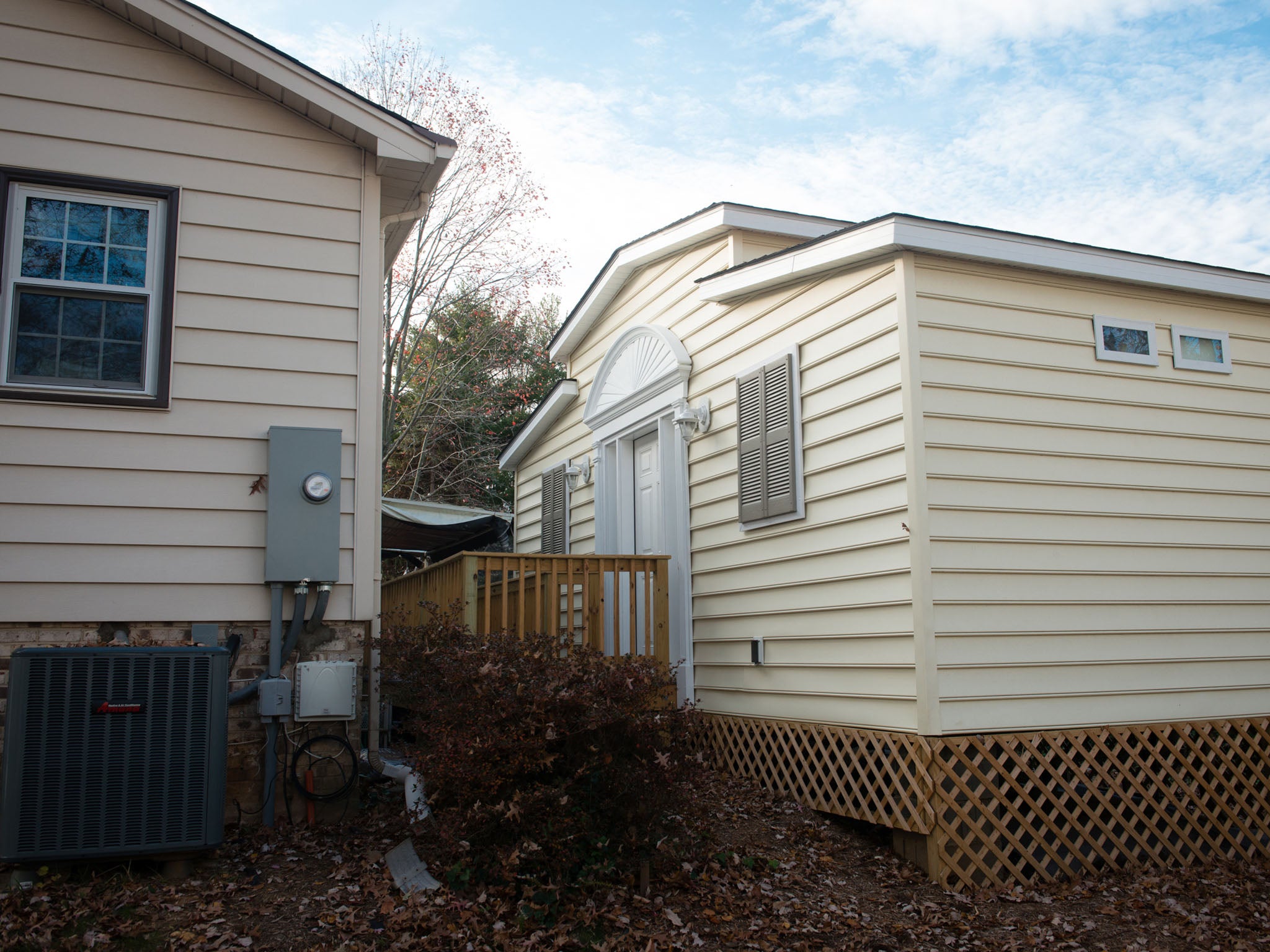 GRANNYPOD: A MedCottage is shown behind a home in Alexandria, Virginia. The small, high-tech cottages function like portable hospital rooms, and they're designed to allow a family to look after an aging or disabled loved one on their property.