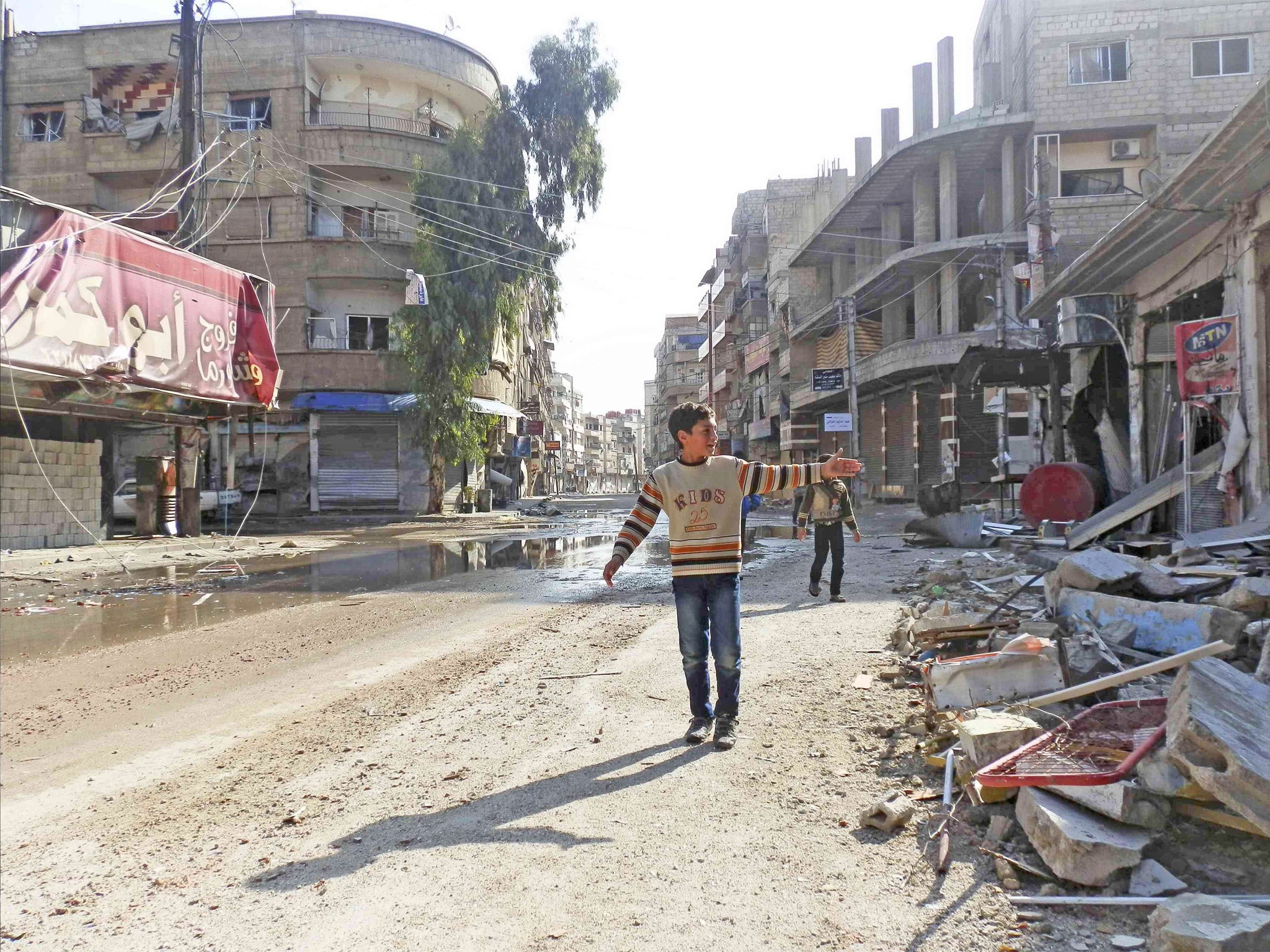 Damaged buildings in Daria, Damascus.The Syrian capital has been heavily
shelled by the regime