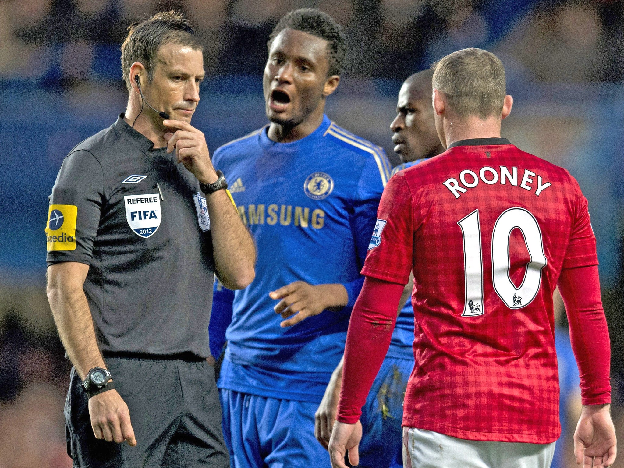 Mark Clattenburg and John Obi Mikel during the match