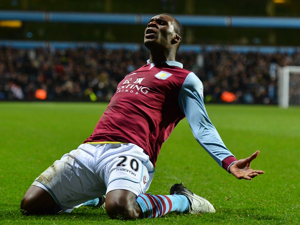 Christian Benteke celebrates a late winner against Reading